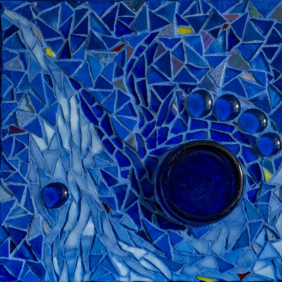 Blue glass and grout on wood.